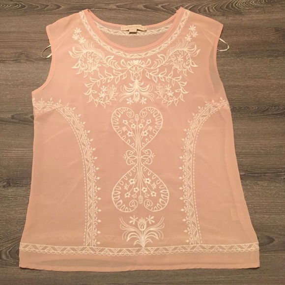 Sheer pale pink blouse with white embroidery