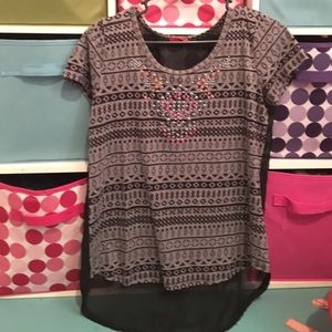 I'm selling a shirt that will need a tank top