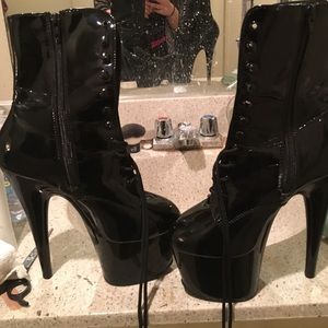 Stiletto laced up black boots