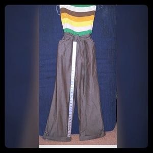 Striped top and blue jean jumpsuit