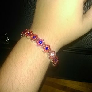 Orange and blue metal bracelet