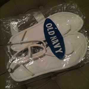 White sandals. Brand new. Never worn