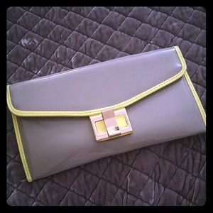Gray and yellow clutch