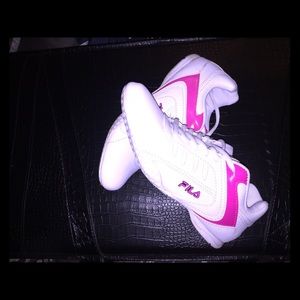 Pink and white Fila shoes