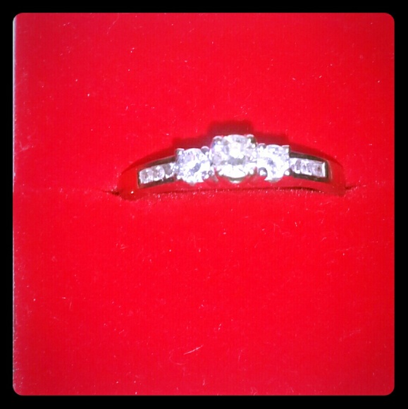3 stone diamond ring.