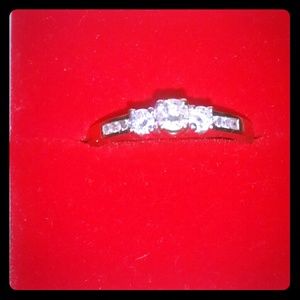 3 stone diamond ring.
