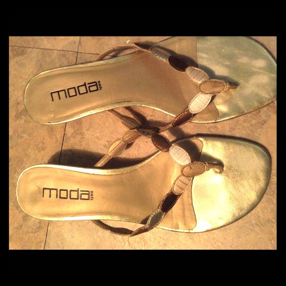 Golden sandals with a heel