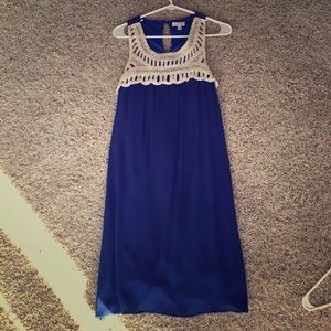 Blue dress with crocheted detailing.