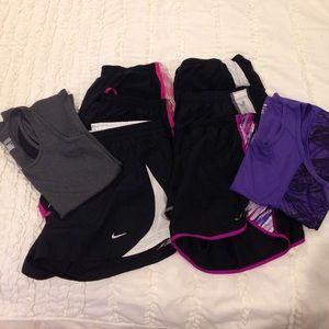 Lot of workout shorts and tanks