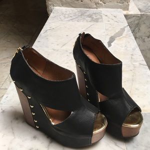 Chinese Laundry black and brown platform shoes.