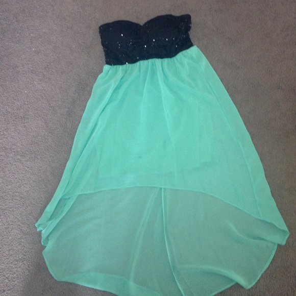 Teal and black strapless formal dress.