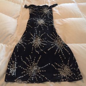 Silk scoop neck just below knee. slight flare