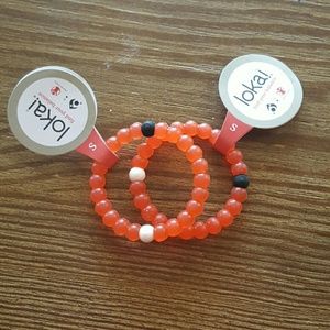 Two size small red Lokai bracelets