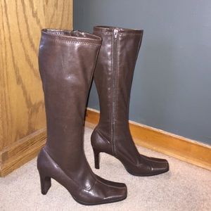 Tall brown heeled boots