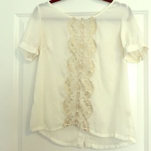 Really cute cream top with gold lace