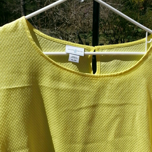 Jaclyn Smith yellow blouse