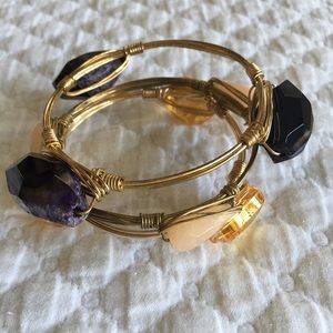 Set of three stackable bracelets.