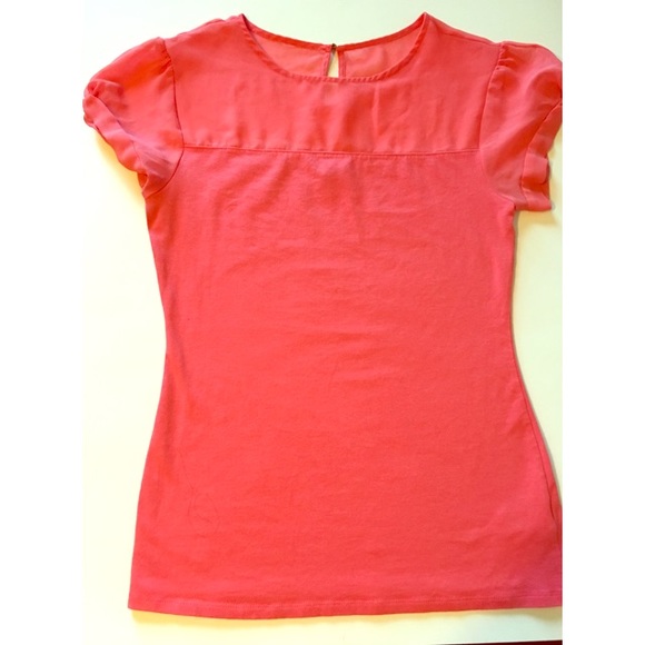 Coral top with partial sheer shoulders