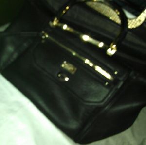 Michael kors  bag has some minor wear