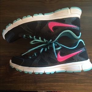 Pink/black/blue nike running shoes