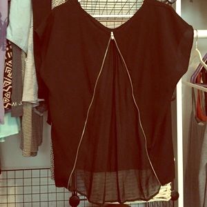 Black top with zipper up the back