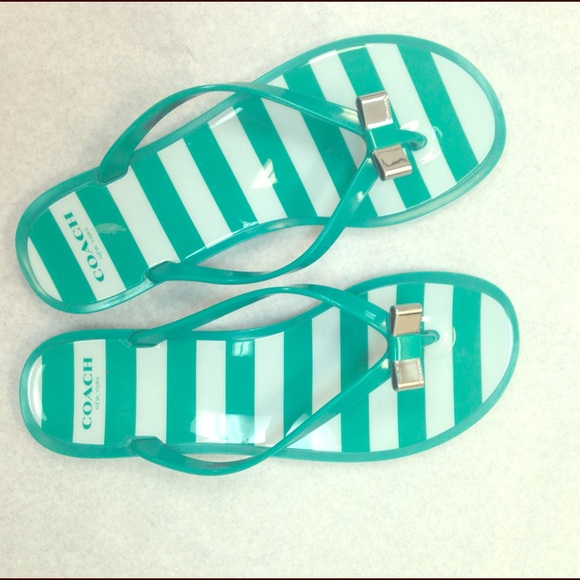 Green Coach jelly flip flops