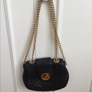 Henri Bendel black and gold. Perfect condition