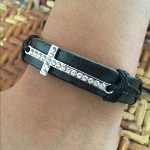 Leather bracelet with rhinestone cross