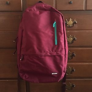 Incase burgundy backpack