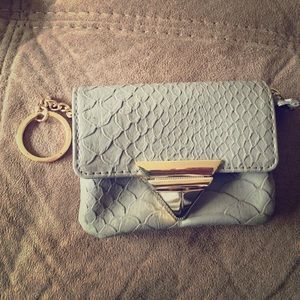 Gray wallet with gold clasp