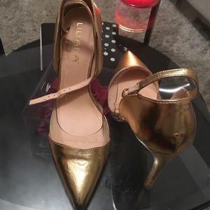 Gold and clear pumps