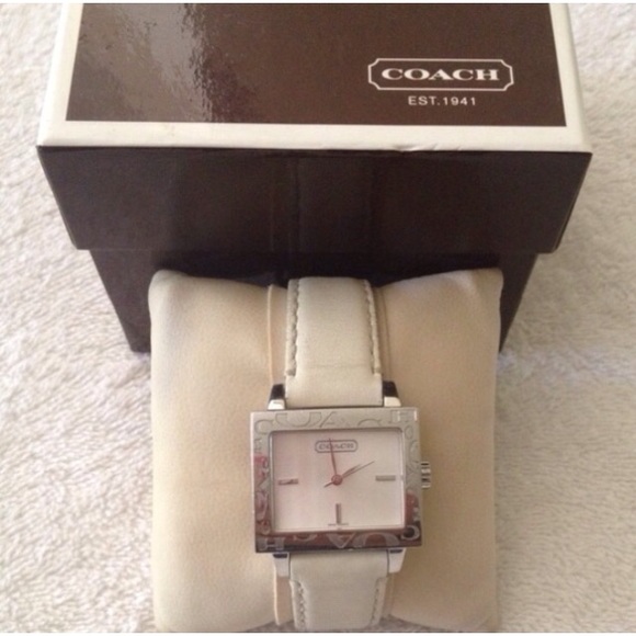 Off white colored Authentic Coach watch