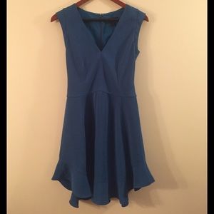 Blue dress with cap sleeve, ruffle hem