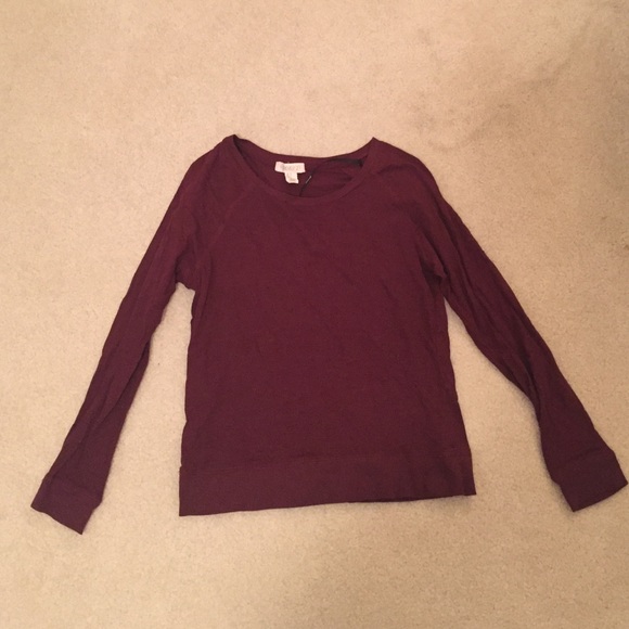 Maroon long sleeve shirt.