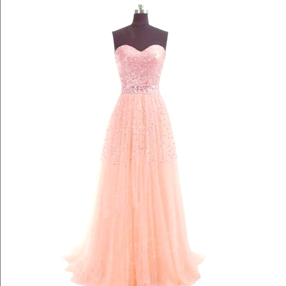 Beautiful soft pink, strapless prom dress.