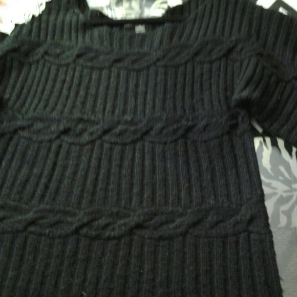 Sweater wit beutifful knitting  ornaments in front