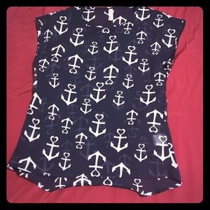 A navy blue anchor sheer top