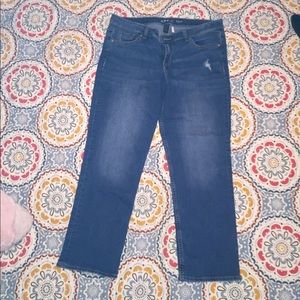 Capris with small distressed rip on right hip