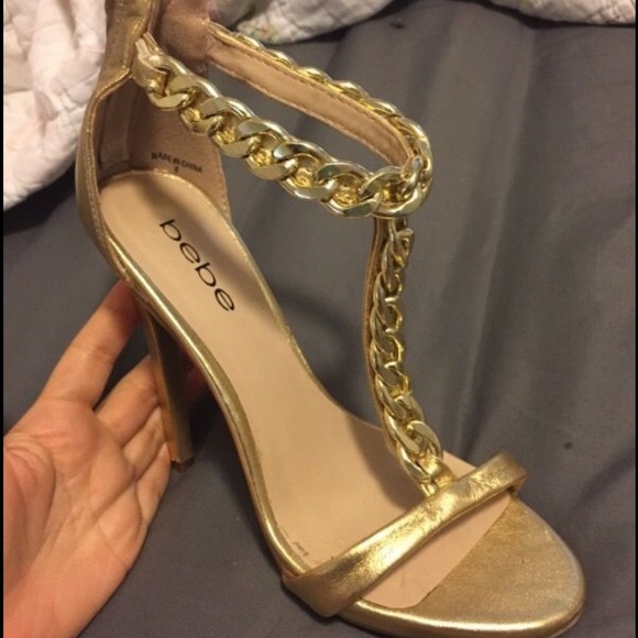 Gold t-strap heels