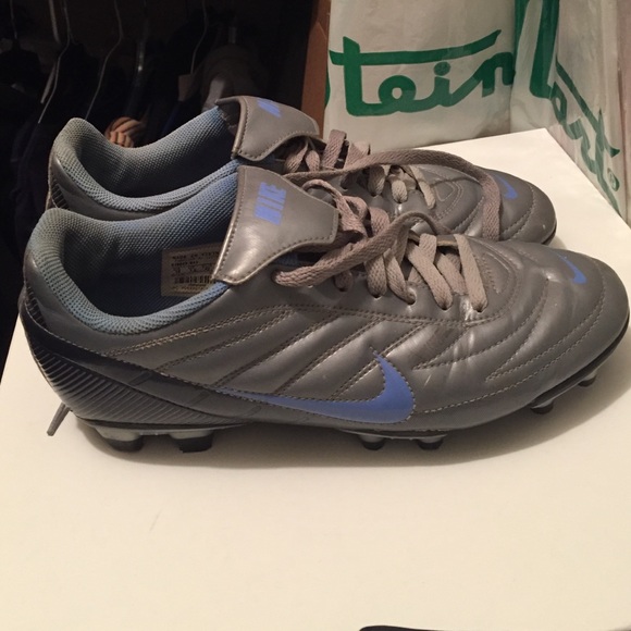 Nike women's purple and blue cleats.