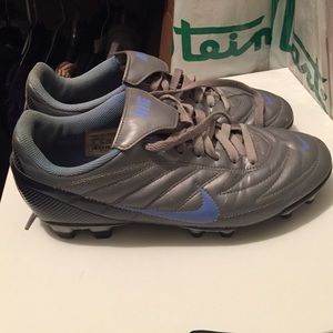 Nike women's purple and blue cleats.