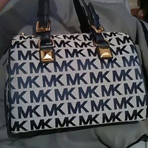 Temp Price drop(FIRM)...Authentic MK Grayson Med