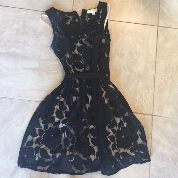 Black lace dress with a white underlay