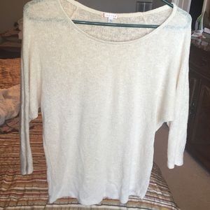 Sheer tan shirt.