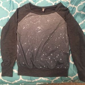 Grey long sleeve shirt with sequence front.