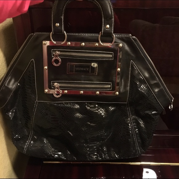 Black purse. Not original Versace.