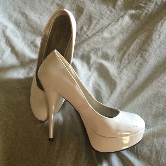 White platform pumps