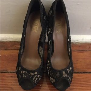 Black lace pumps