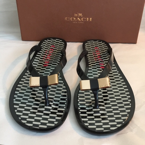 Coach flip flop sandals.