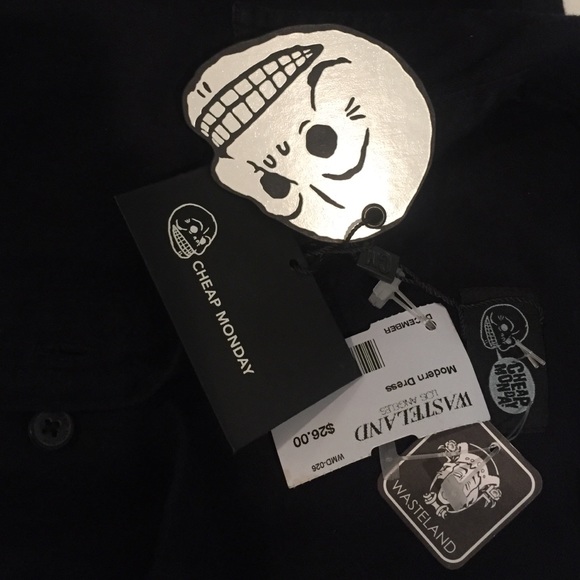 Short navy dress, with pockets on either side - Picture 2 of 4